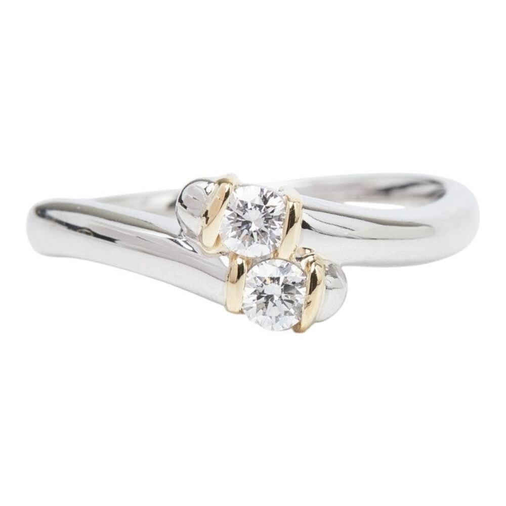 Platinum 900 and K18YG Yellow Gold Ring with 0.21ct Diamonds.